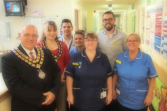 Mayor of Crowle Councillor Eric Dinsdale, Mayors consort Sue Dinsdale, Jessie Gungor, student, Laura Malton, staff nurse, Sharon Vickers, ward manager, Daniel Ryder, advanced healthcare assistant and Judy Algar, staff nurse.