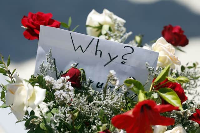Flowers at the scene of the massacre in Sousse as sources warned the British death toll could rise (PA).