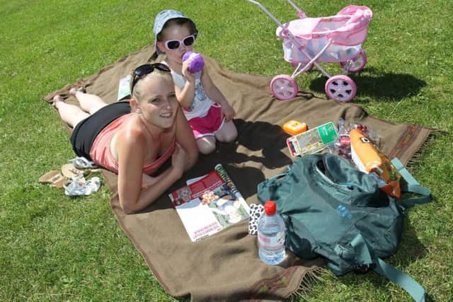 Samantha Butcher, and Layla Dickinson, aged three, enjoying the sunshine in Endcliffe Park