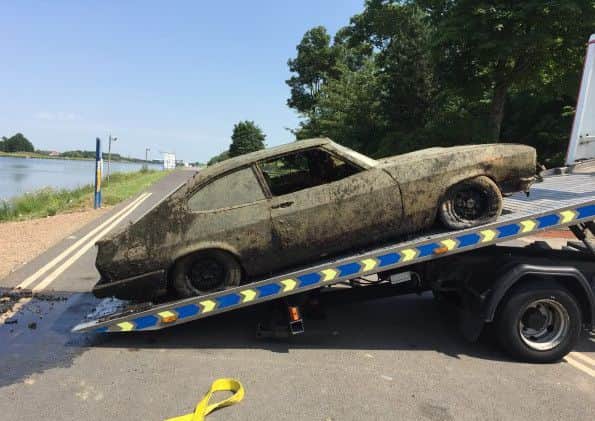 The Capri car pulled from beneath the water