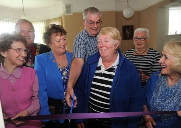 West Lindsey Dementia Support Group chairman, Ralph Jones and his wife Jacki cut the ribbon to launch the new group who meet at Gainsborough House on Parnell Street, with invited guests, Gainsborough's Mayor and Mayoress, Mick and Doreen Tinker, member Shirley French, left and group organisers, Jean Male and Mavis Wharton, second right and right respectively.