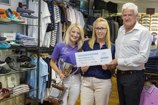 Rebecca Dickenson, The Vanilla Rooms of Bawtry; Emma McKay, Aurora Wellbeing Centres being presented with a cheque for £9,200 by Russell Jones, Robinsons of Bawtry