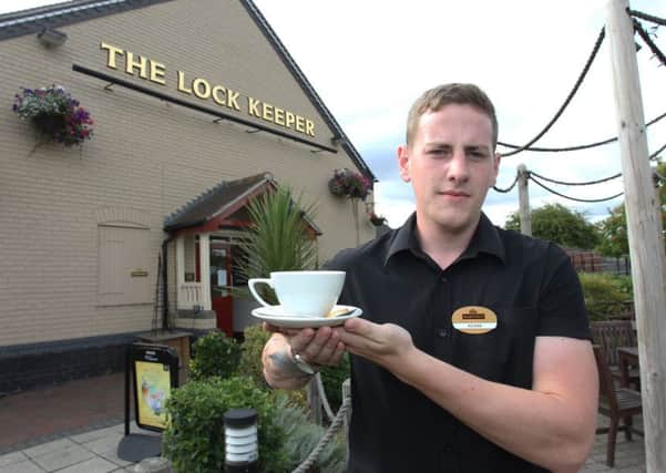 Guardian reader offer of a free cup of tea or coffee at the Lock Keeper on Sandy Lane. Pictured is Adam Hunt with the offer.