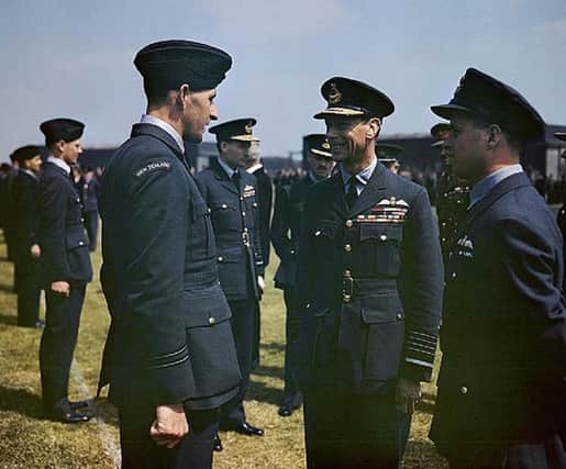 King George VI talking to Squadron Leader Les Munro