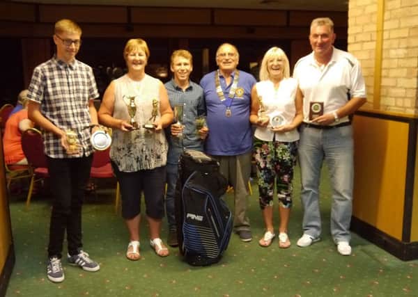North Notts Lions president Mel Blacknell is pictured with the winners.