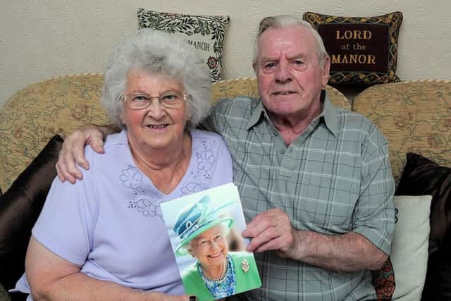 Celebrating 60 years of Marriage, Lydia & Ken Adam, of Chatsworth Court, Harworth.
Lydia (78) & Ken (82) met while working for Rose Brothers in Gainsborough.
Lydia was born at Gringley on the Hill near Retford, & Ken was from Bourne in Lincolnshire.
They have lived in Harworth for 48 years
They are pictured with a congratulations card from the Queen.
NGAS 6-8-15 Diamond Couple, Lydia & Ken Adam (1 & 2)