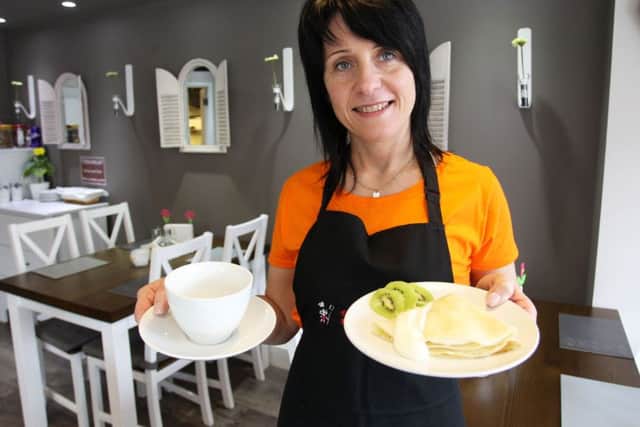 Guardian freebie offer this week of a pancake with white cheese and cream with a drink at Sister's Diner on Gateford Road. Pictured is owner Maggie Kopanska with the offer.