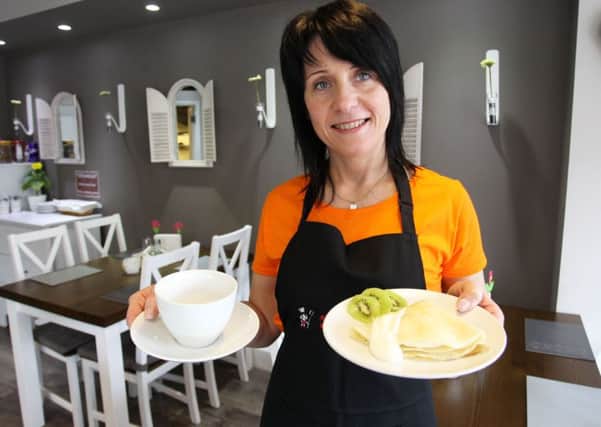 Guardian freebie offer this week of a pancake with white cheese and cream with a drink at Sister's Diner on Gateford Road. Pictured is owner Maggie Kopanska with the offer.