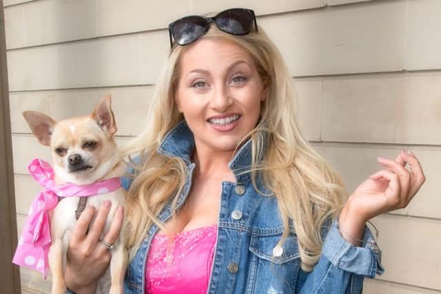 Abi Weigold, who stars as Elle Woods in STOS' Legally Blonde - The Musical, with a four-legged friend hoping to be in the show. Picture: Mark Feakins