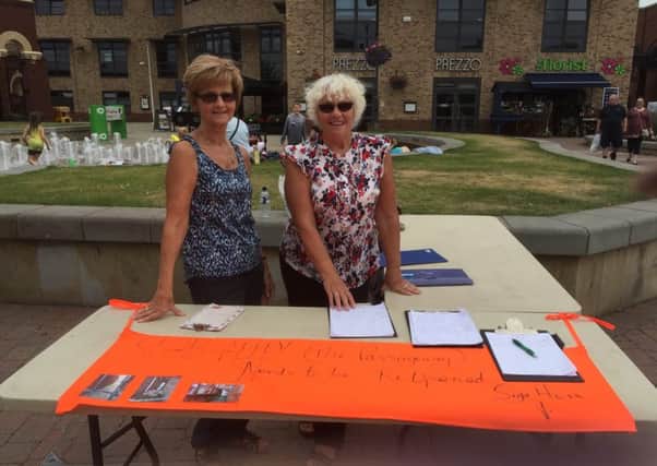 Rose and Pamela collecting signatures in Marshalls Yard
