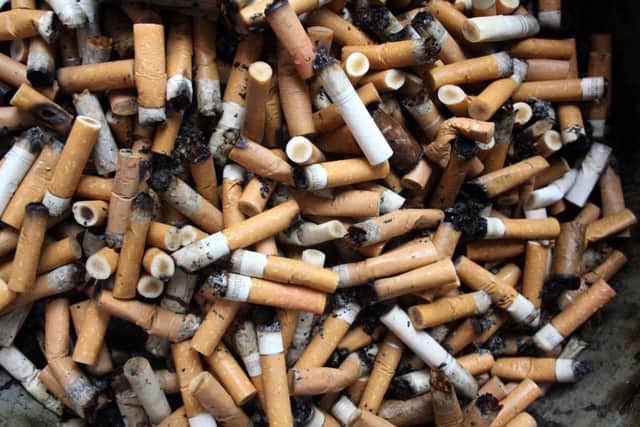 Smoking cigarette butts
