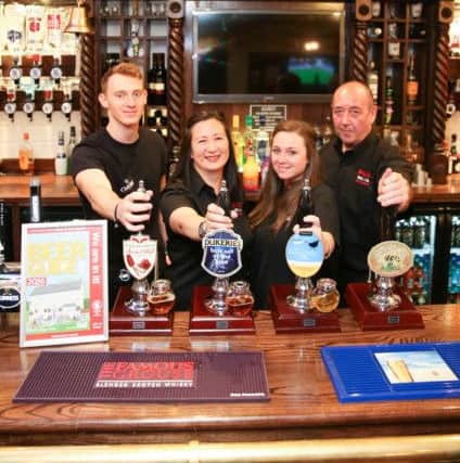 The Unicorn, have attained a placing in CAMRA's Good Beer Guide 2016 L>R Michael Lantieri, John Darb, Michelle Stowell-Ng Licencee Helen Packard,