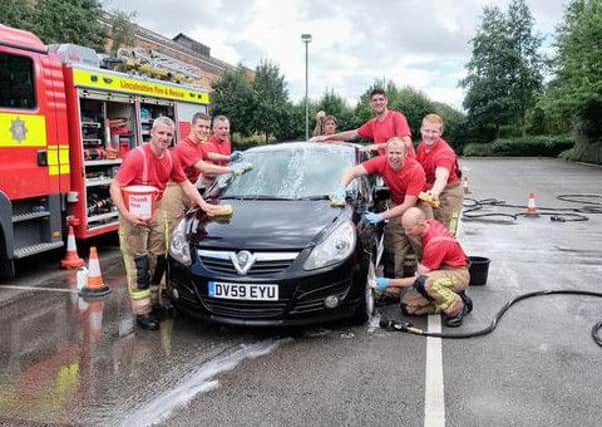 Firefighters charity car wash in Gainsborough
