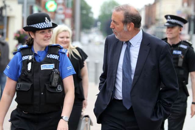 Nottinghamshire Police and Crime Commissioner Paddy Tipping on a walkabout around Kirkby. Paddy is pictured with PCSO Madeleine Sefton.