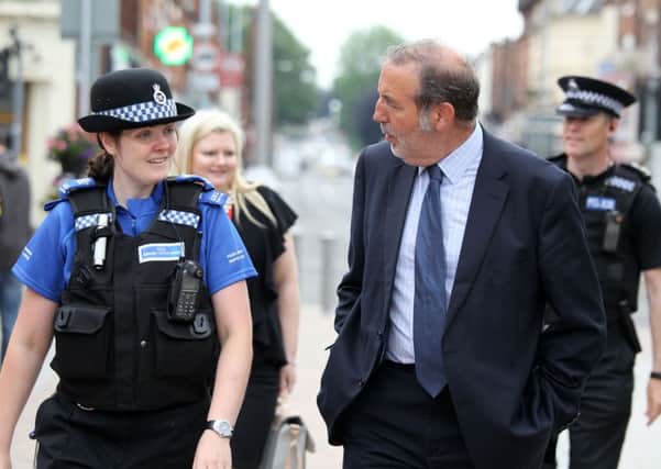 Nottinghamshire Police and Crime Commissioner Paddy Tipping on a walkabout around Kirkby. Paddy is pictured with PCSO Madeleine Sefton.