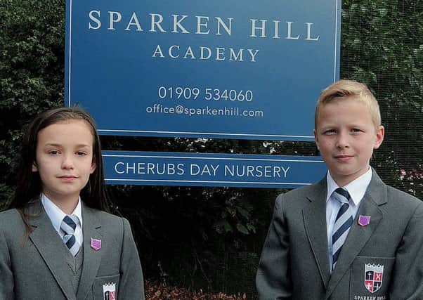 Various pics of Sparken Hill School, Worksop for feature.
NWGU 3-9-15 Sparken Hill, New School sign with Head Girl & Boy, Maddison & Aidan (3 & 4)