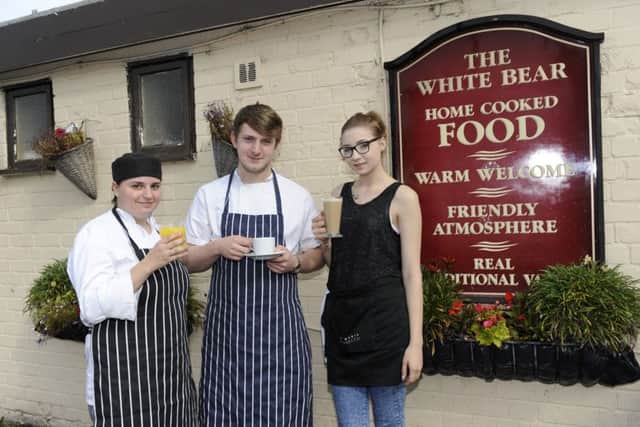 Epworth Bells reader offer - A free coffee, tea or orange juice at The White Bear, Epworth. Staff members, from left, Paige Benson, Harry Barlow and Coral Thompson
