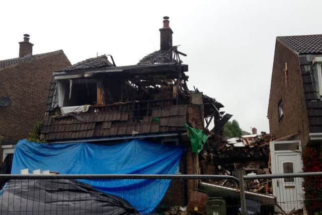 The scene of the explosion and fire in Riddings in which two people died.