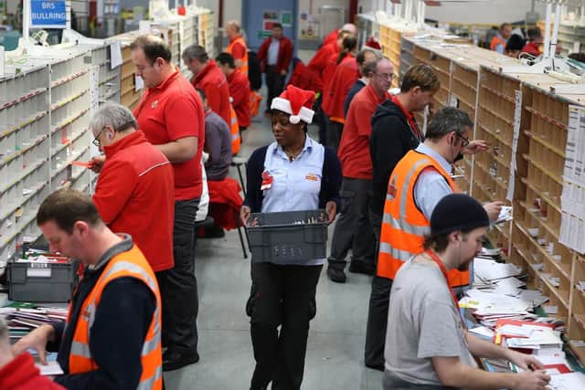 Royal Mail has announced plans to recruit 19,000 workers to help deal with the seasonal increase in post and parcels. Photo: Andrew Milligan/PA Wire