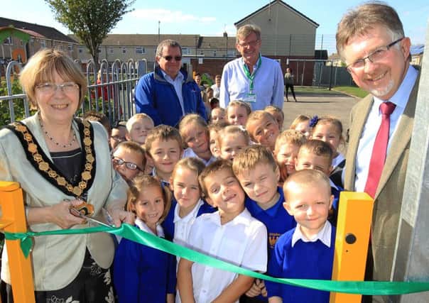 The opening of a new play park off Lime Tree Avenue in Carlton in Lindrick. Pupils from Kingston Park Academy attended the opening with councillors and parents. Pupils are pictured with Coun Alan Rhodes and the Chairman of Nottinghamshire County Council Coun Sybil Fielding, and local councillors.