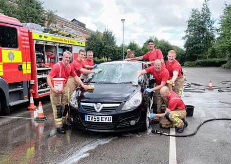 Firefighters charity car wash in Gainsborough