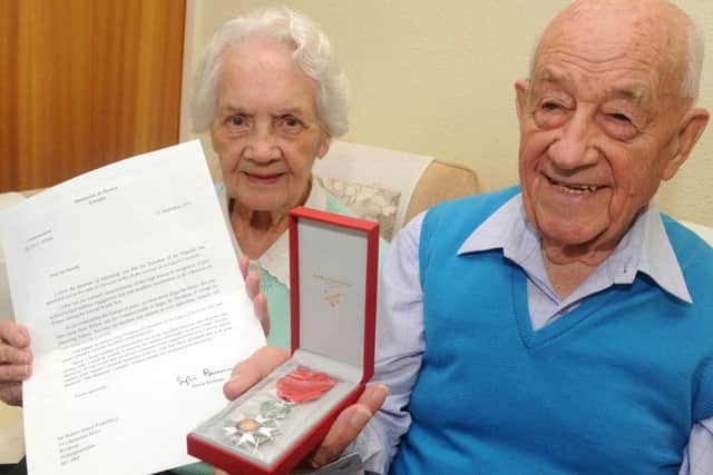 Robert Parnell, of Chesterton Drive, Worksop has been awarded with the Liberation of France medal for his services in World War Two, with his wife Dorothy. Picture: Andrew Roe
