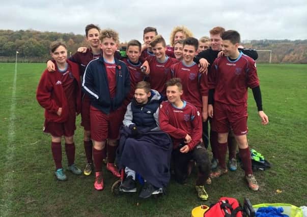 Maltby Juniors Under-15s with their team-mate Kyle Williamson
