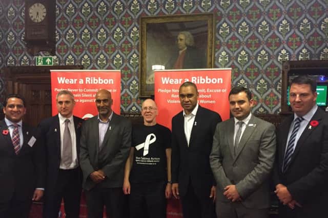 Andrew Percy with White Ribbon presentation