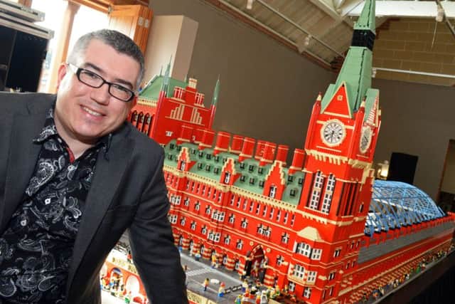 Lego Masterbuider Warren Elsmore pictured with his St. Pancras Station creation, which took over two years to make and includes over 150,000 lego pieces. Picture: Marie Caley NWGU Lego MC 7