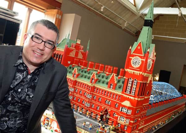 Lego Masterbuider Warren Elsmore pictured with his St. Pancras Station creation, which took over two years to make and includes over 150,000 lego pieces. Picture: Marie Caley NWGU Lego MC 7