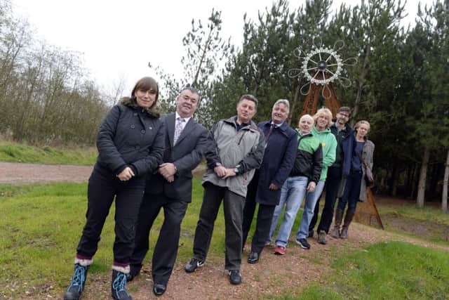 The official unveiling of the Gateway Sculpture at Manton Pit Wood, Worksop. From left, artist Jo Wheeler, Colin Donaghy - Pandrol UK Ltd, volunteer Michael King, Cllr Glynn Gilfoyle, Nigel Dawber and Peter Fendley from Worksop Harriers, Ted Wooddisse, Green Estates land manager and Ann Leigh-Browne Notts County Council