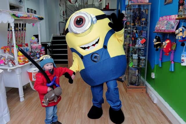Launch of the 'Action Heroes Parties' shop on Bridge street, Worksop Ronnie Herd (3) with a minion