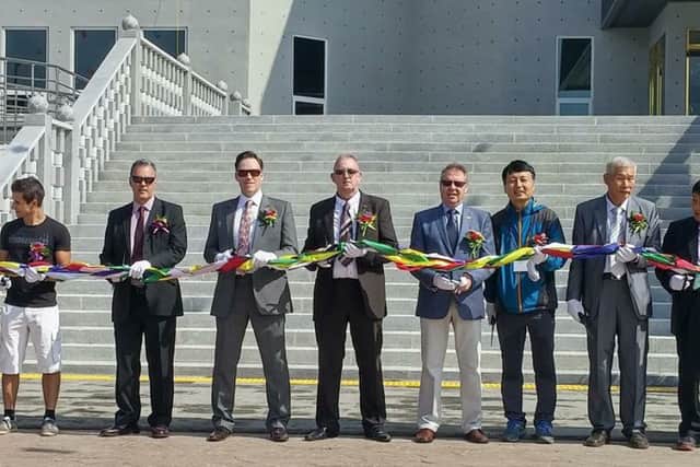 Master Andrew Blinston, centre, of the Lynx Academy in Retford, at the ribbon-cutting ceremony to mark the opening of the new World Mudo Academy in Korea