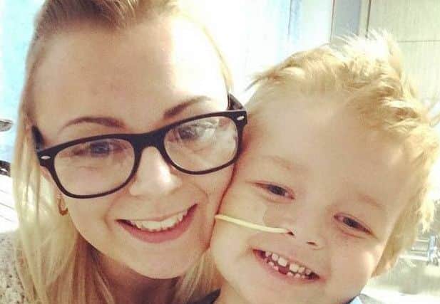 Caiden Cawte-Hull with his mother Danielle.