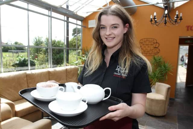 Gainsborough Standard freebie offer at Retford and Gainsborough Garden Centre. Pictured is Amy Alfonso with the offer.
