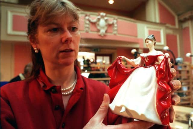 ANTIQUES FAIR,CAVENDISH HALL,CHATSWORTH Ann Kohrs with one of her Royal Doulton figures.
