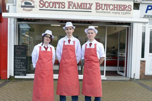 A new butchers has opened in Langold, Scott's Butchers. Butcher Scott Jopling, centre, with
Echo Jopling, left and Keane Barson