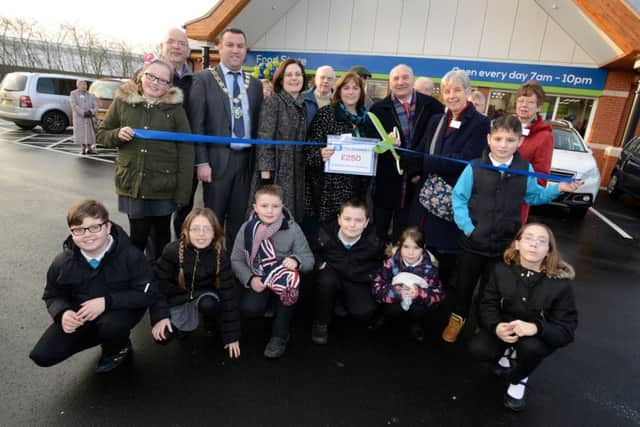 Store Manager Phil Goddard, Mayor of Gainsborough Coun Matthew Boles, Lincolnshire Co-op Chief Executive Ursula Lidbetter, Sharron Close, Executive Principal of Whites Wood Academy, Lincolnshire Co-op Vice President Stuart Parker, Rev Kathy Colwell and Sandra Dodsworth from St Andrews United Church.