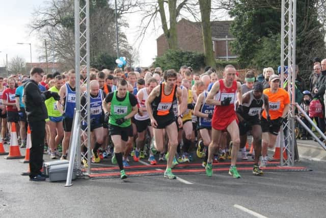AND THEYRE OFF! -- hundreds of runners gather at the start line for the popular, annual Gainsborough and Morton 10k race, which gets under way on Sunday, March 20.