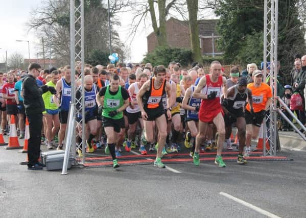 AND THEYRE OFF! -- hundreds of runners gather at the start line for the popular, annual Gainsborough and Morton 10k race, which gets under way on Sunday, March 20.