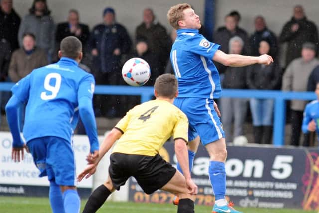 Gainsborough Trinity v Bradford Park Avenue.
Jamie Yates meets a high ball.