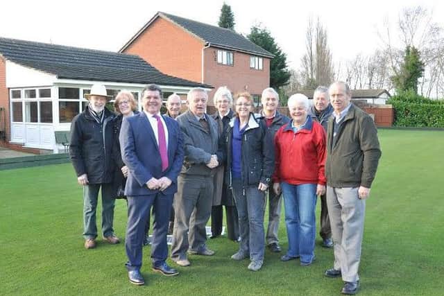 Front Row L-R : Coun Kevin Greaves; David Payne, chairman of the flat green bowls section at Worksop Cricket and Sports Club, Coun Julie Leigh, cabinet member for neighbourhoods at Bassetlaw District Counci and other members of the flat green bowls section at Worksop Cricket and Sports Club.