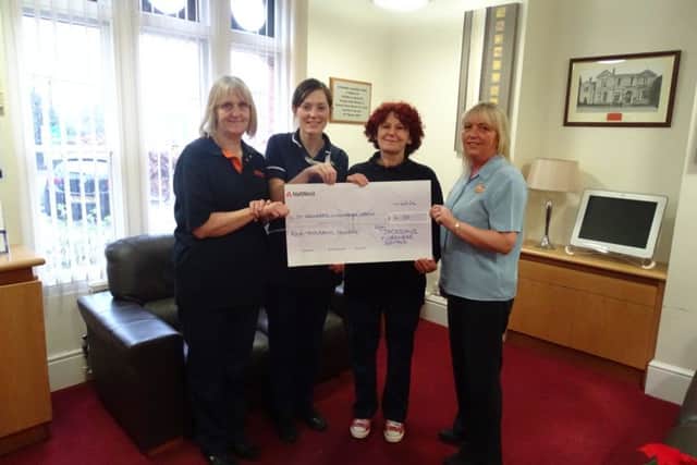 Jacksons Workwear Rental have raised £4,000 for St Barnabas Lincolnshire Hospice