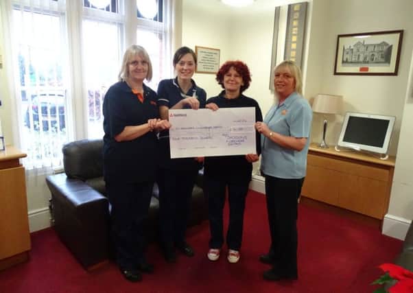 Jacksons Workwear Rental have raised Â£4,000 for St Barnabas Lincolnshire Hospice