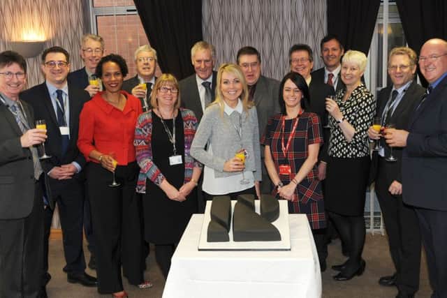 Senior staff at North Notts and Rotherham Colleges, join to mark their merger at the Carlton Road site in Worksop on Monday.