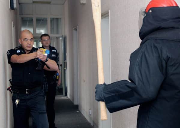 Humberside Police Officers spend the day training to use a Taser Gun-
NBFP PA1339-13e