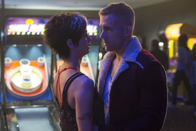 Deadpool. Pictured: Morena Baccarin and Ryan Reynolds. PA Photo/Fox UK.