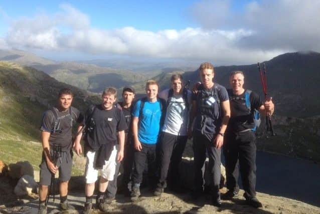 Darren Fitzpatrick and colleagues walk Hadrian's Wall for charity.
