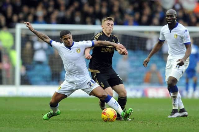 Date:6th February 2016. Picture James Hardisty.
Leeds United v Nottingham Forest, pictured Leeds United's Liam Birdcutt, tackles Nottingham Forest Ben Osborn.