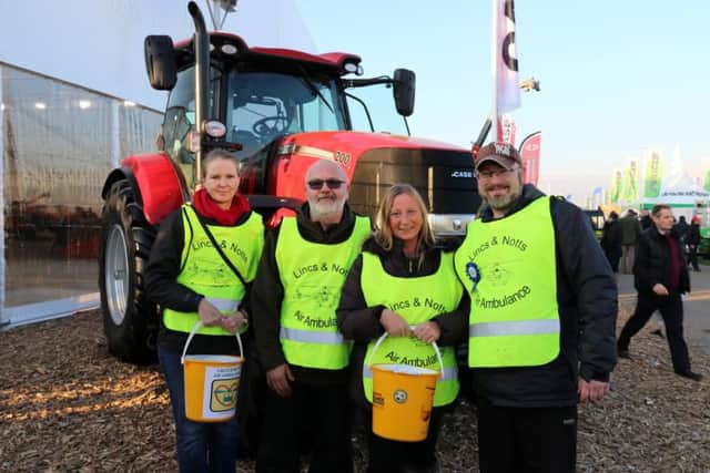 Staff and volunteers raised more than £8,000 for the Lincolnshire & Nottinghamshire Air Ambulance at the LAMMA show